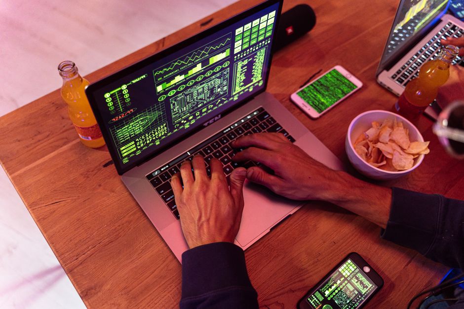 Student reviewing programming modules on a laptop