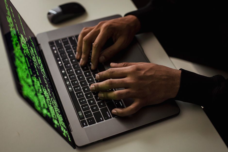 Student reviewing Python exercises on a laptop