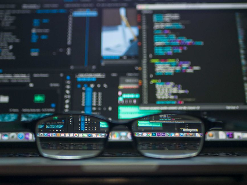 Laptop with Python code on screen